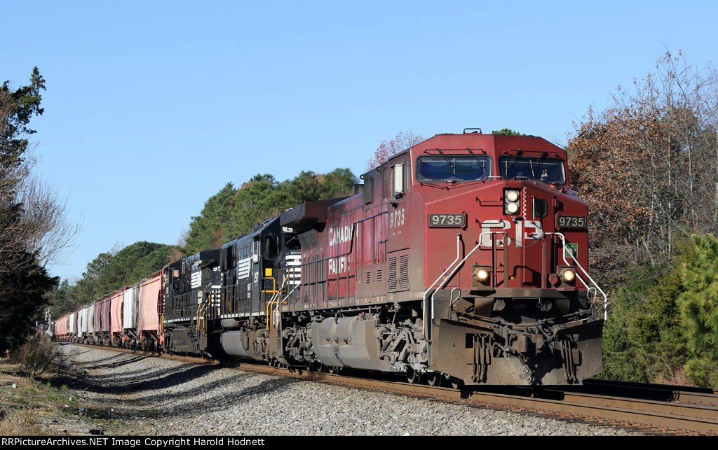 CP 9735 leads NS train 61U eastbound